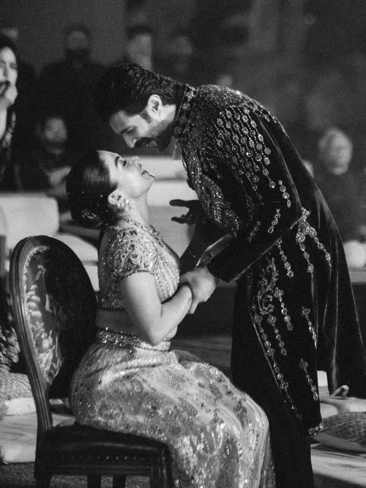 For the Sangeet night, the couple opted for custom Falguni Shane Peacock creations. They made an elegant pair as Rashmika stunned in an ivory lehenga with heavy work while Vijay gave royal vibe in layered sherwani